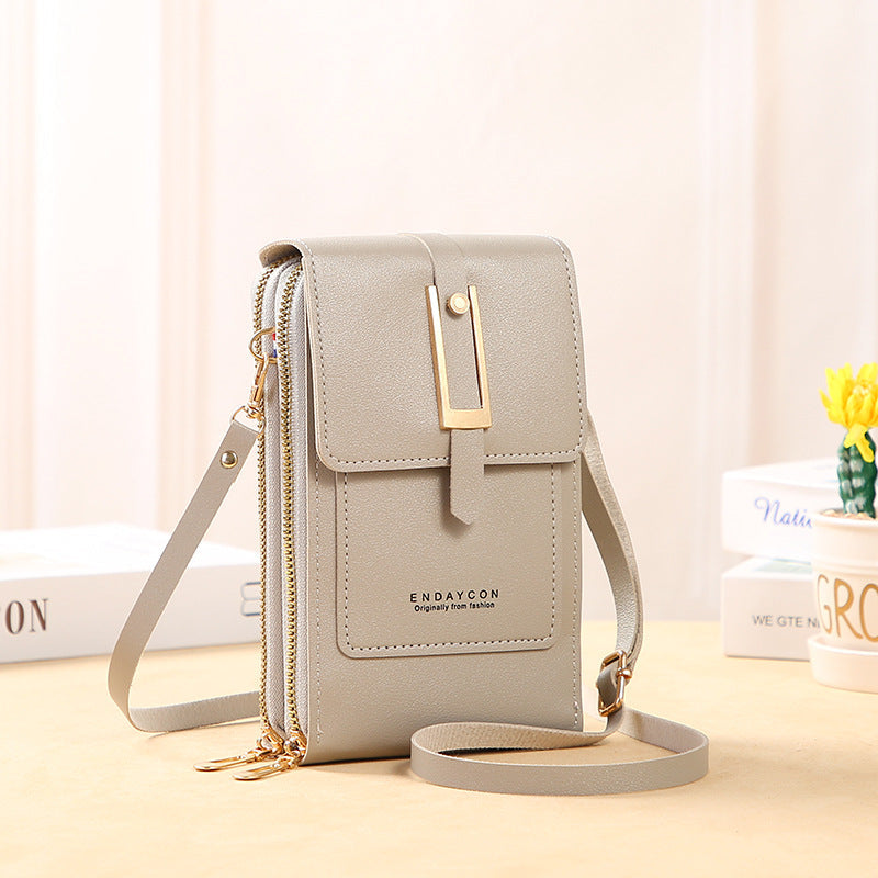 👜📱 Simple and elegant touchscreen phone bag for women, designed to be worn over the shoulder.