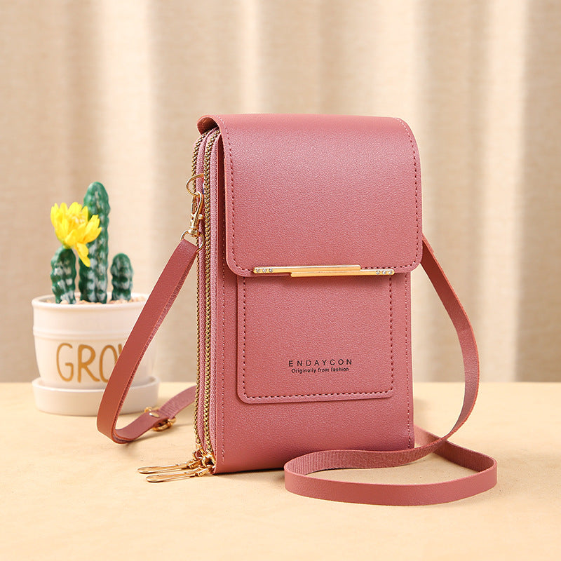 👜📱 Simple and elegant touchscreen phone bag for women, designed to be worn over the shoulder.