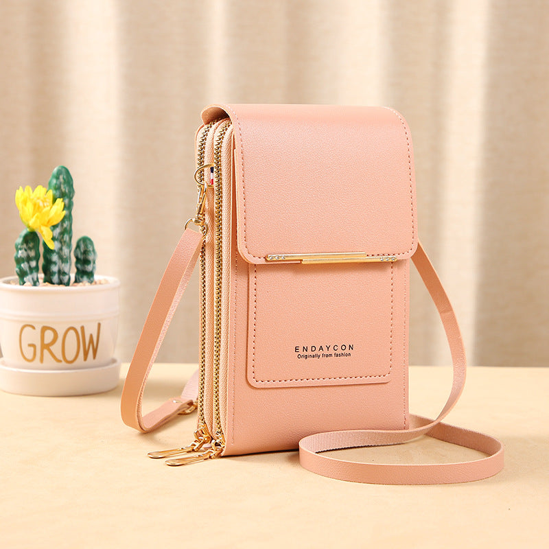 👜📱 Simple and elegant touchscreen phone bag for women, designed to be worn over the shoulder.