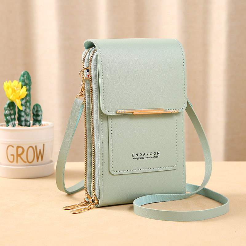👜📱 Simple and elegant touchscreen phone bag for women, designed to be worn over the shoulder.