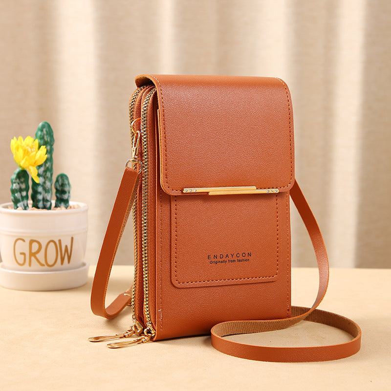 👜📱 Simple and elegant touchscreen phone bag for women, designed to be worn over the shoulder.