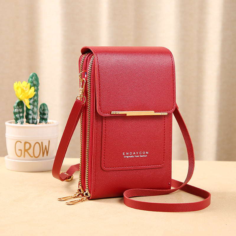 👜📱 Simple and elegant touchscreen phone bag for women, designed to be worn over the shoulder.